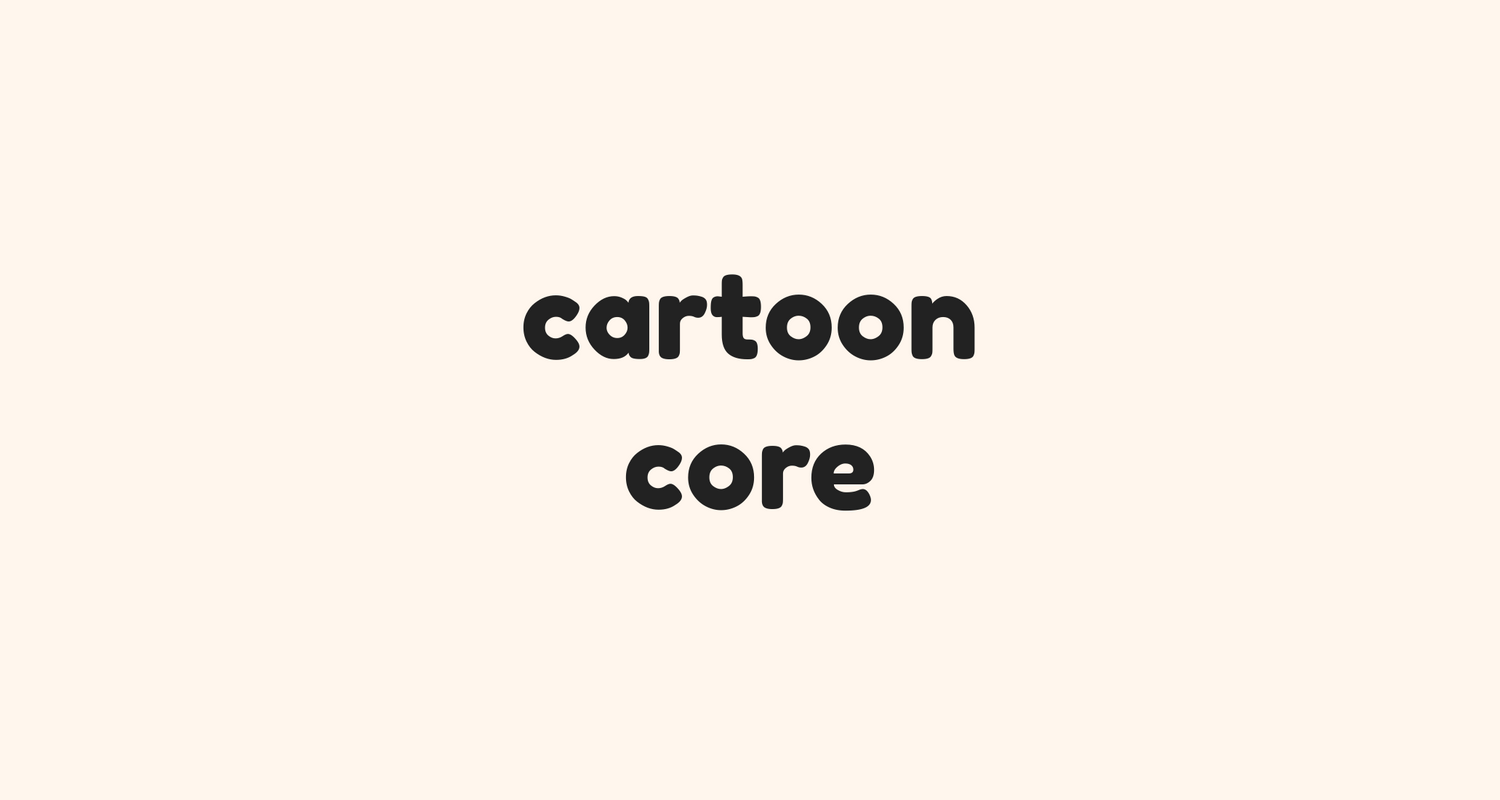Cartoon Core text displayed in playful round font on pastel peach — represents fun, animated streetwear drop from IVAAHI.